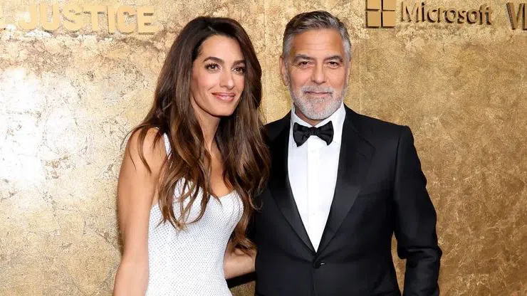 Джордж Клуни със съпругата си.